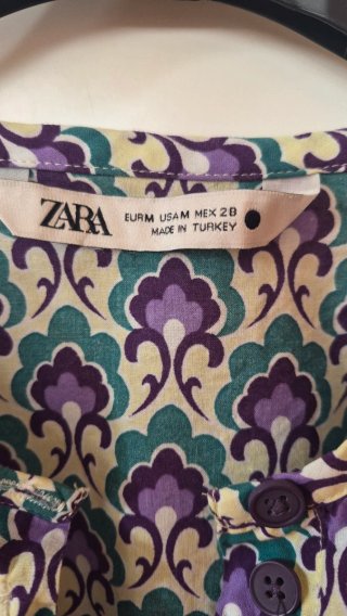 Blusa estampada manga larga
