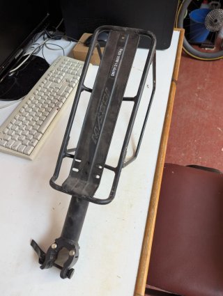 Porta bultos tija bicicleta