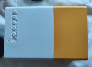 Mini proyector Zerone amarillo y blanco