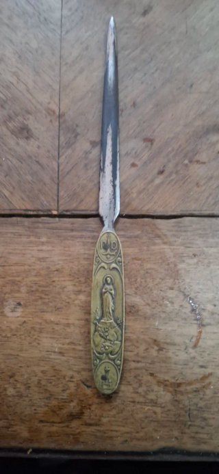 Carta antigua con figura religiosa