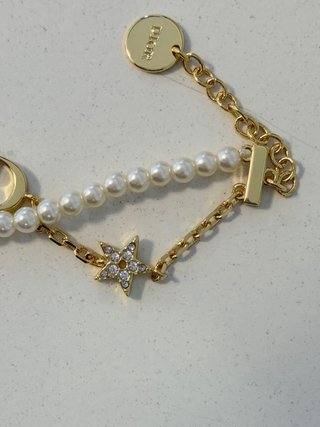 Pulsera Dior Perlas y Estrella Dorada