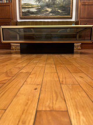 Mesa de centro cristal y metal dorada