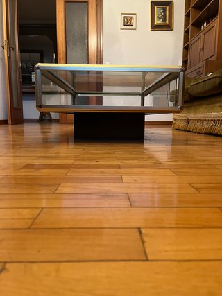 Mesa de centro cristal y metal dorada