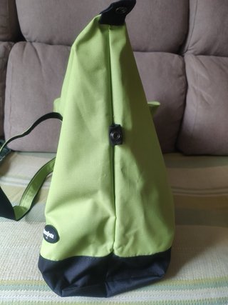 Bolso de viaje Samsonite verde y negro con asas.