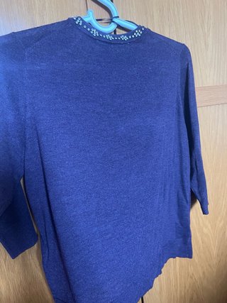 Chaqueta punto Zara con joyas
