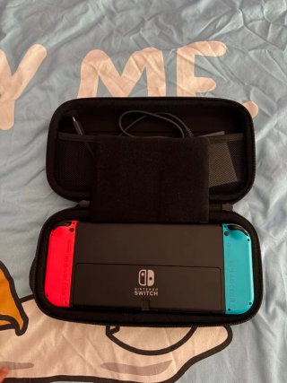 Nintendo Switch OLED + Juegos