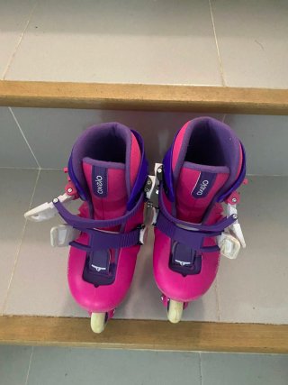 Patines infantiles niña Oxelo rosas y morados