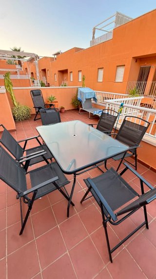 Conjunto mesa cristal y 6 sillones jardín