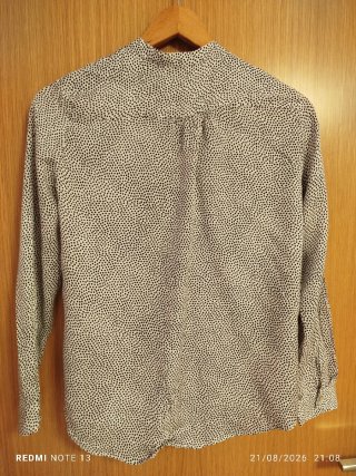 Camisa de lunares blanca y negra