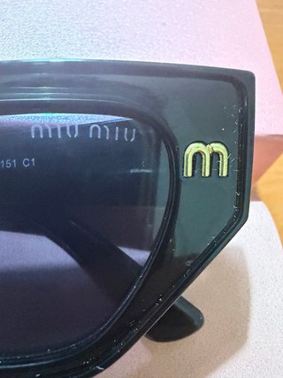 Gafas de sol Miu Miu mujer negras