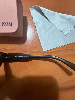 Gafas de sol Miu Miu mujer negras