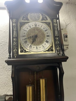Reloj de péndulo antiguo