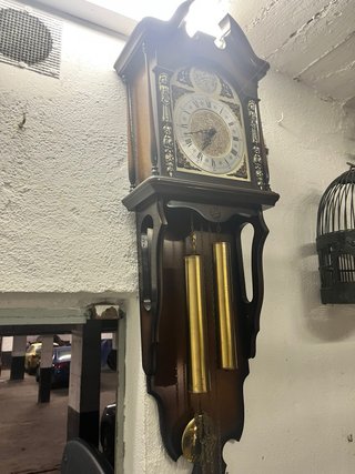 Reloj de péndulo antiguo