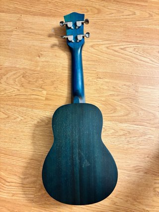 Ukelele verde con funda