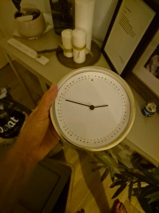Reloj decorativo dorado