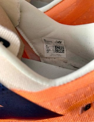 Zapatillas New Balance Rebel V4 Naranja/Blanco