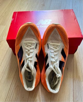 Zapatillas New Balance Rebel V4 Naranja/Blanco