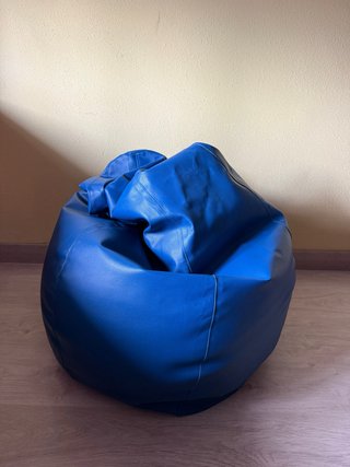 Puf de piel azul