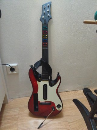 Batería Wii Nintendo y guitarra