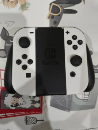 Joy-Cons Nintendo Switch Blancos y Negros