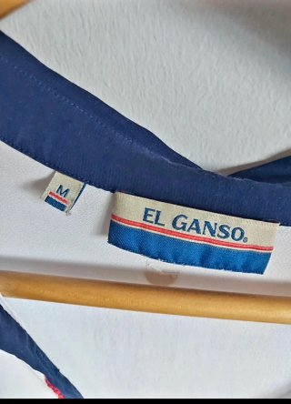 Camisa blanca manga larga cuello azul