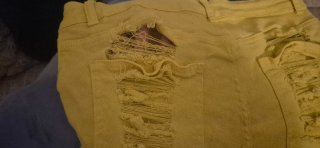 Shorts vaqueros amarillos rotos