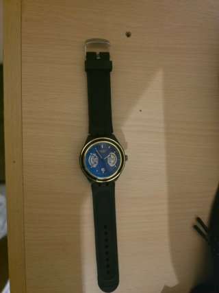 Swatch Reloj Azul y Dorado