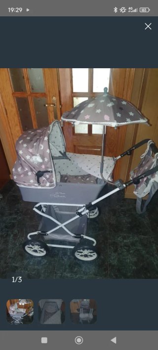 Carro para muñecas reborn con sombrilla