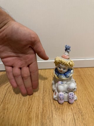 Figura payaso porcelana sentado