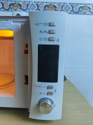 Microondas Candy CMXG22DW