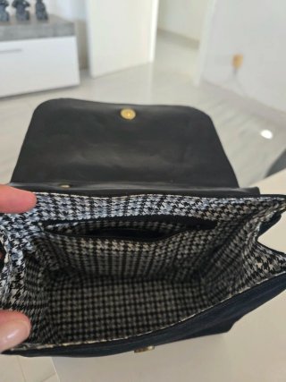 Bolso de fiesta negro con lazo