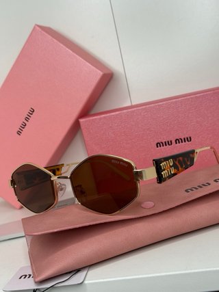 Gafas de sol Miu Miu mujer doradas y marrones