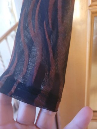 Camisa Bershka animal print manga larga