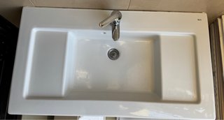 Lavabo Roca blanco con grifo