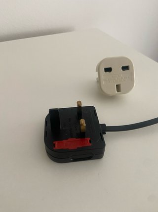 Lámpara de mesa de piedras apiladas