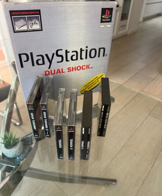 Consola PlayStation Dual Shock + 5 Juegos