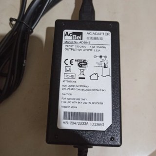 Telecomando e alimentatore decoder Sky