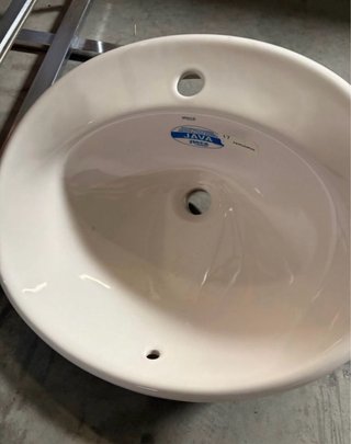 Lavabo de cerámica blanco
