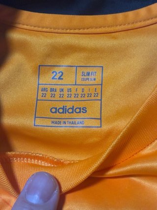 Conjunto Real Madrid naranja 2023-24