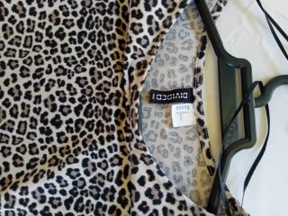 Crop top manga larga estampado leopardo