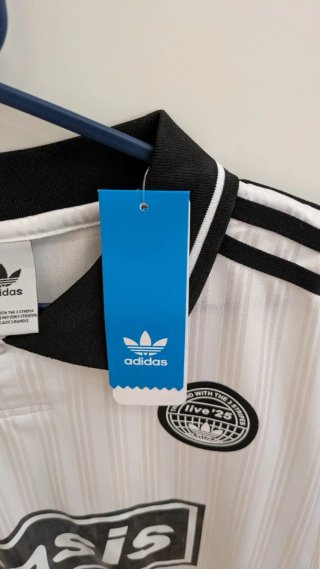 Camiseta Adidas Oasis Live '25 Blanca Negra
