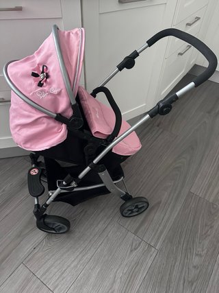 Carrito de muñecas rosa Silver Cross