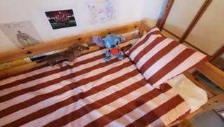 Cama de madera Flexa.