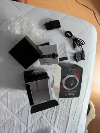 Cargador Garmin Fenix 3 y caja original.