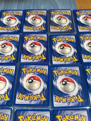 16 cartas pokémon TEAM ROCKET inglés sin repetir