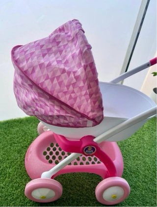 Carrito de paseo para muñecas rosa