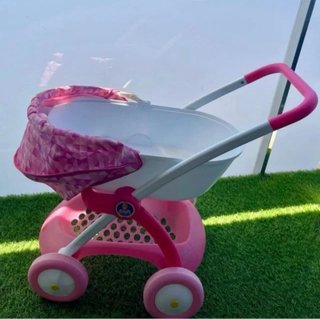 Carrito de paseo para muñecas rosa