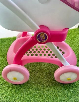 Carrito de paseo para muñecas rosa
