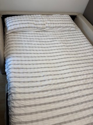 Sofá-cama beige apertura francesa