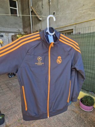 Chándal Real Madrid Champions League Negro Naranja